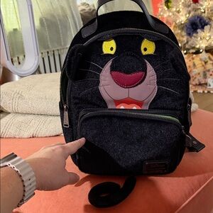 Loungefly plush mini backpack used once. EUC